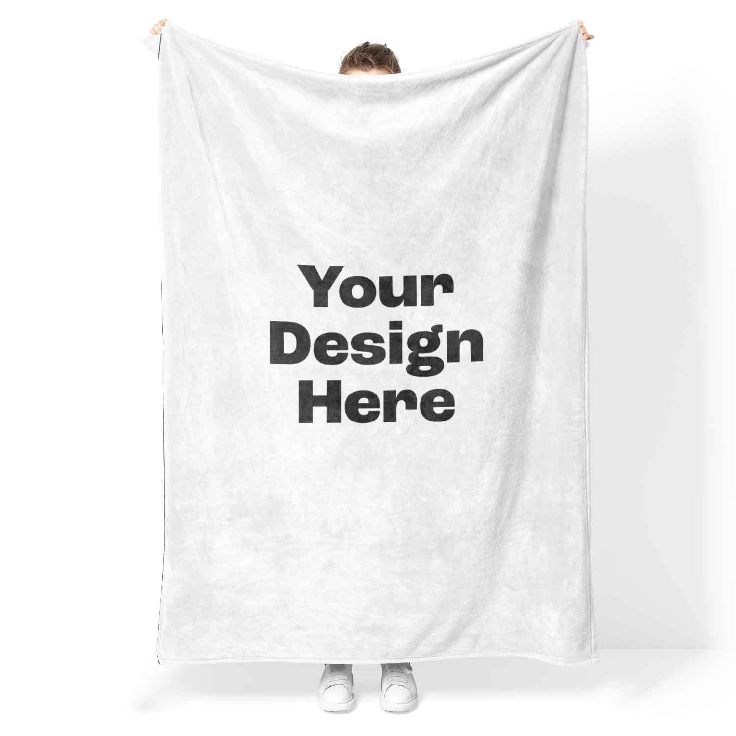 White blanket with 'Your Design Here' text held by a person on a white background