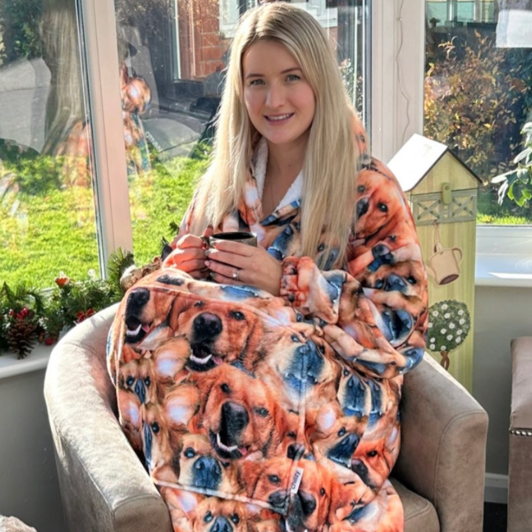 customer wearing their dog mash personalised hooded blanket